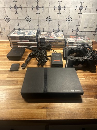 Sony play station slim - play,